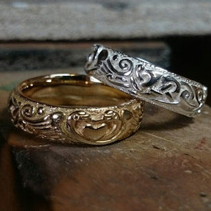 Bespoke Celtic Wedding Rings made from 14ct Gold and Sterling Silver handmade by Elena Brennan.