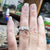 Hand showing off the Celtic spirals Irish wedding ring