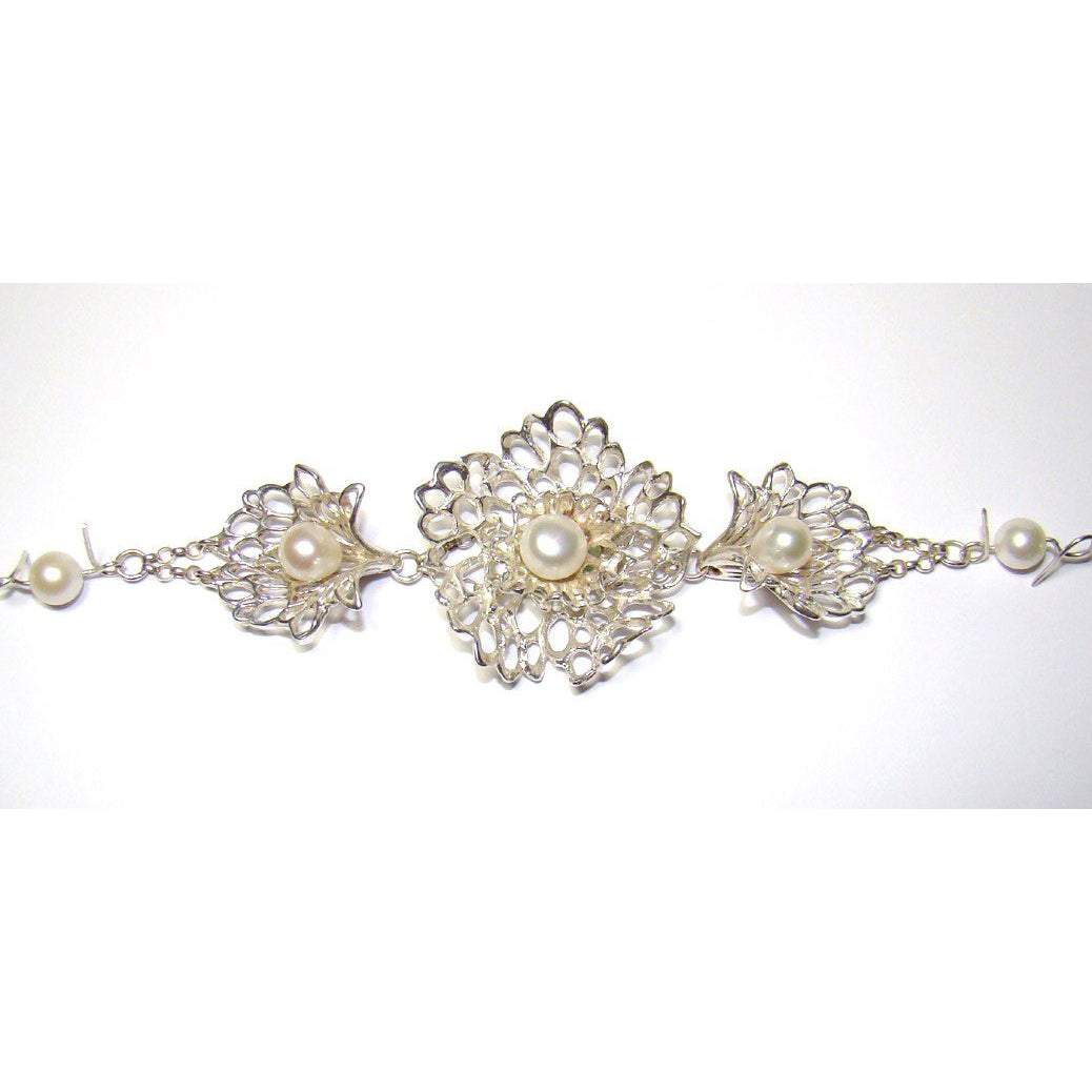 Petals & Pearls Gossamer Lacy Flower Bracelet is a handcrafted timeless bespoke piece. Handmade in Ireland.