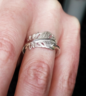 "Cherish" is a sterling silver angel feather ring. This gift from the Angels will bring hope and joy to all. Irish handmade jewellery by Elena Brennan made in Cavan Ireland. 