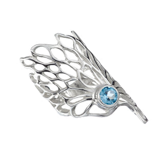 Gorgeous Gossamer Ring with a 6mm Blue Topaz gemstone setting.