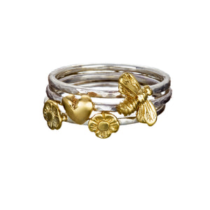 Sterling silver Irish stacking rings with gold symbols, by Elena Brennan Jewellery