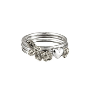 Irish stacking rings with silver Celtic symbols, by Elena Brennan Jewellery