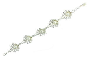 Petals & Pearls Gossamer Bracelet with a classic silver finish, an effortlessly elegant piece.