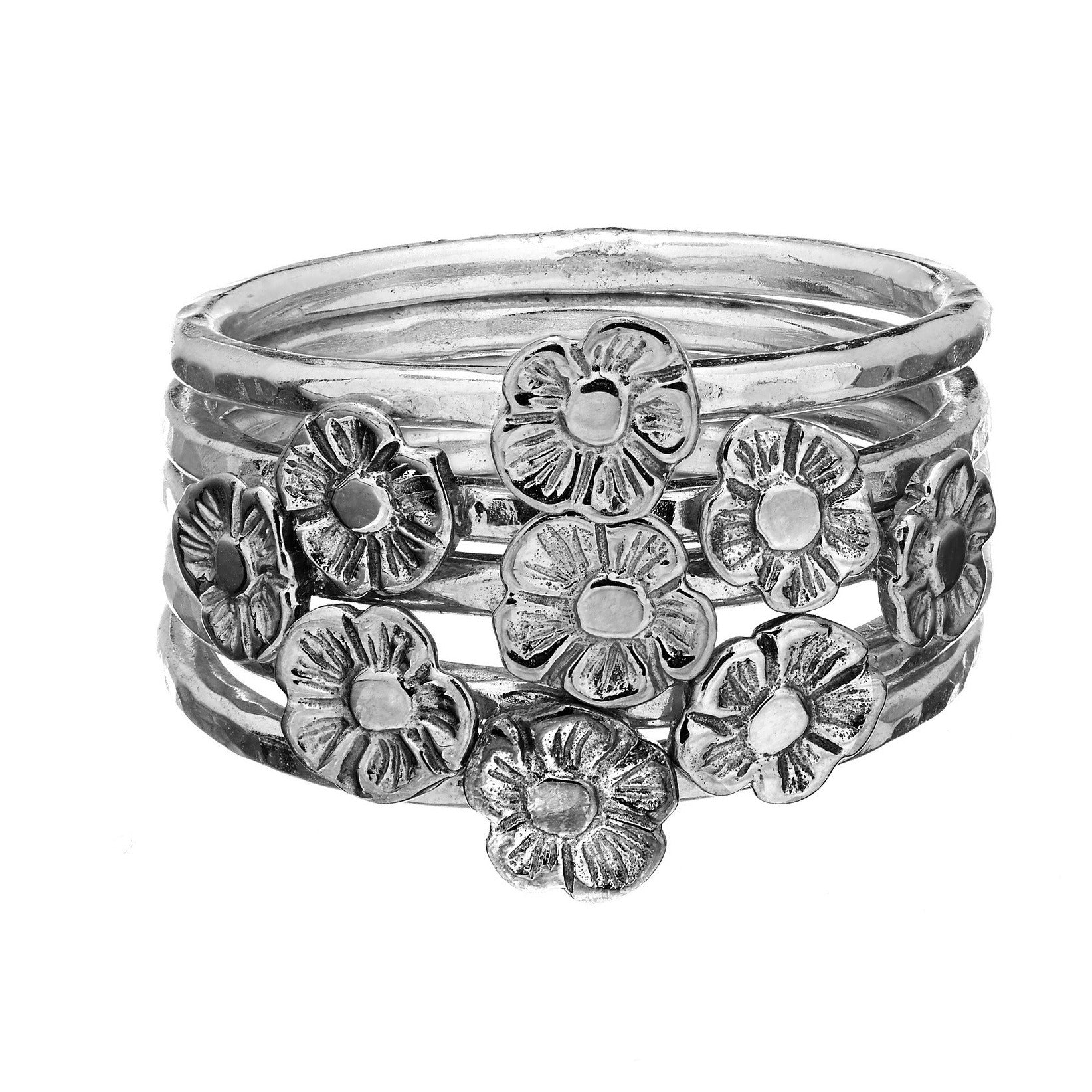 Tiny Flower Stacking Rings handcrafted from Sterling Silver.