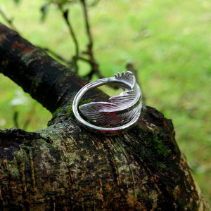 Earth Angel Feather Ring wrap around detailing handcrafted in sterling silver by Elena Brennan Jewellery, photographed in a nature setting