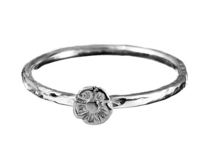 One Tiny Flower Stacking Ring in Sterling Silver.