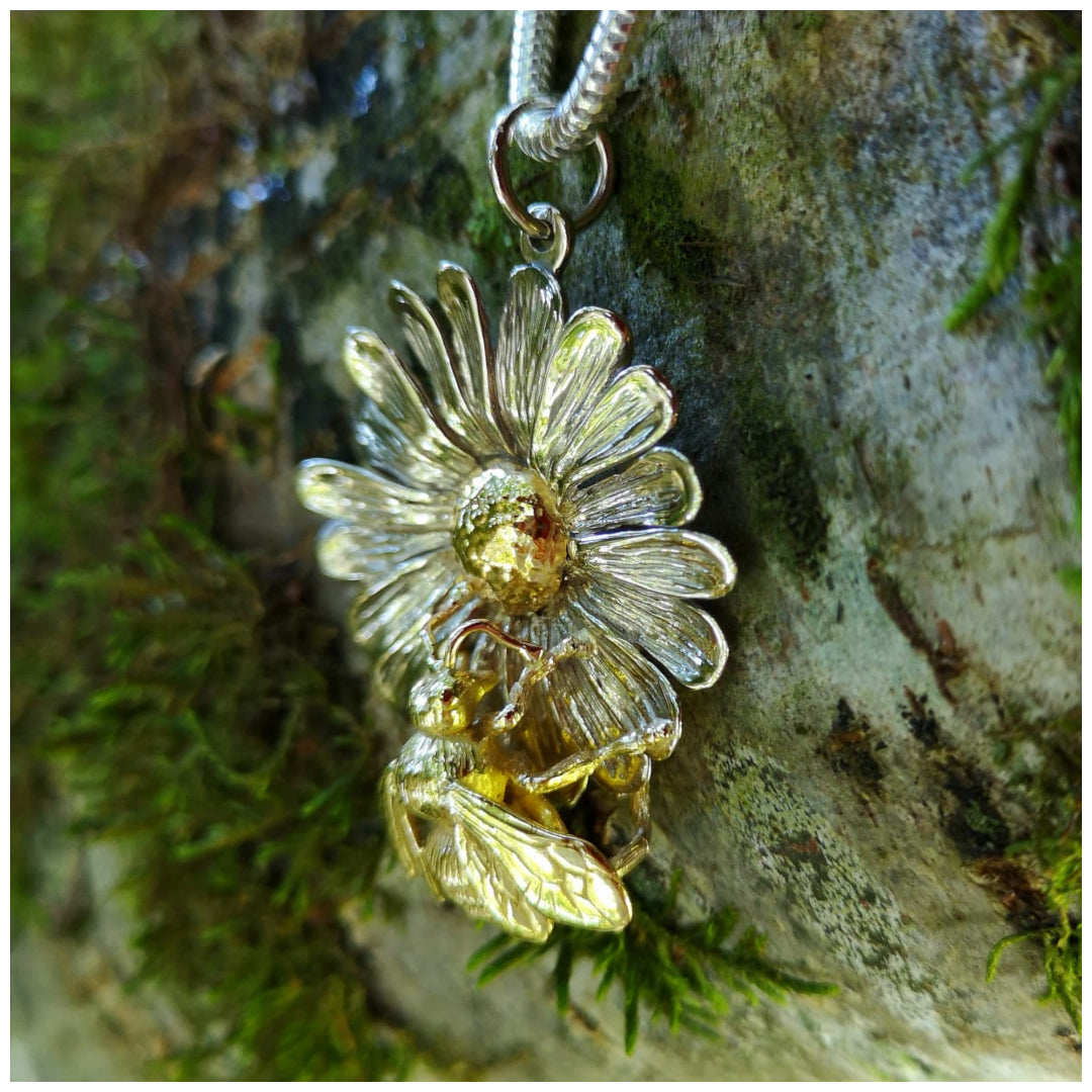 Bespoke gold and silver Bee and Daisy Necklace handmade by Elena Brennan Jewellery in Ireland.