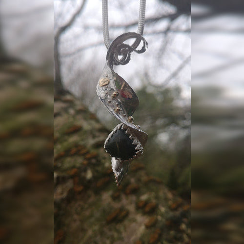 A bespoke Mount Everest Pendant handmade by Elena Brennan Jewellery in Ireland.