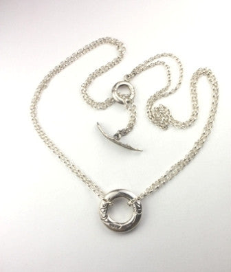 Angel halo and wing pendant made of sterling silver, part of the My Angel jewellery collection.