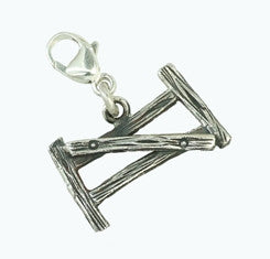 Little Gate charm made of sterling silver, handcrafted in Cavan, Ireland by Irish jewellery designer Elena Brennan