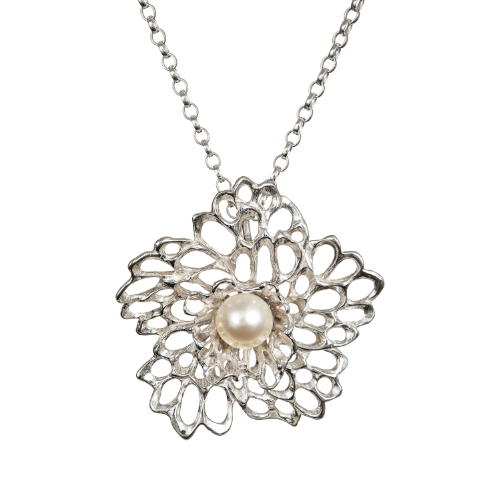 Petals and pearls flower pendant made of sterling silver. Designed and handmade in Ireland by Elena Brennan.