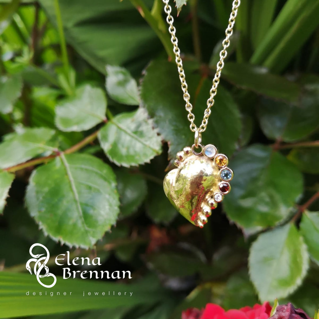 Gold heart birthstone pendant, handmade in Cavan by Irish jewellery designer Elena Brennan