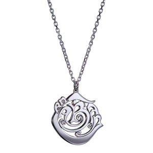 An Cabhán sterling silver pendant inspired by the drumlins of County Cavan, Elena's home county.