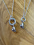 Sterling silver halo and chunky heart pendants, made in Ireland. Part of Elena Brennan's My Angel jewellery collection.