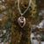 Sterling silver Angel Hug Pendant with angel wings embracing 10ct rose gold heart, its a special gift to show your love! Part of Elena Brennan's My Angel Jewellery collection.