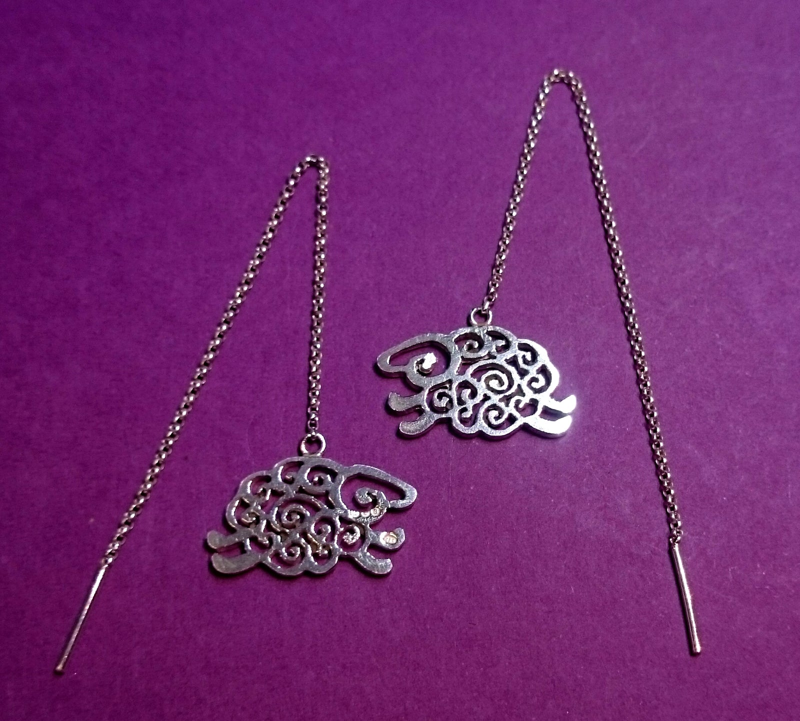 Celtic spiral sheep pull through earrings from the Simply Sheep collection, handmade in Cavan, Ireland, by Irish jewellery designer Elena Brennan.