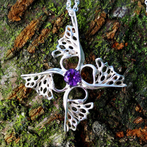 Crusader Children of Lir Cross handcrafted from Sterling Silver with Amethyst gemstone setting. This swan pendant is inspired by an Irish legand, the Children of Lir.