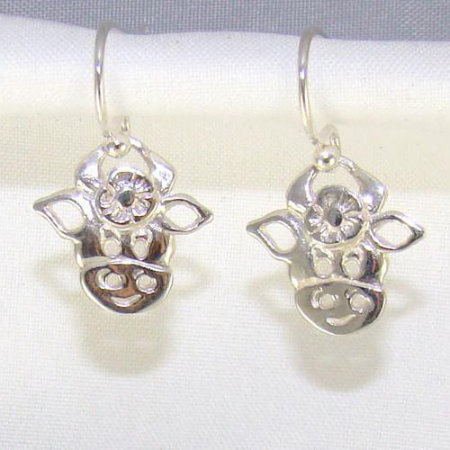 Silver Daisy The Cow Drop Earrings handcrafted and designed in Ireland.