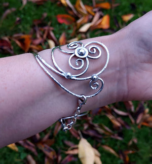 Sterling Sliver Children of Lir Four Swan Bangle, handcrafted in Cavan, Ireland and inspired by Irish mythology.