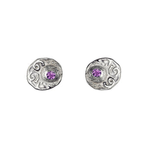 Sea themed earrings made of sterling silver and set with a amethyst.
