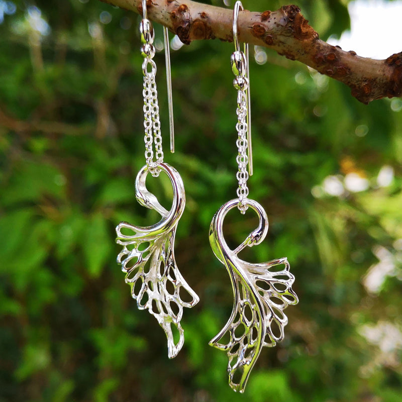 Swan drop earrings inspired by the Children of Lir legend.