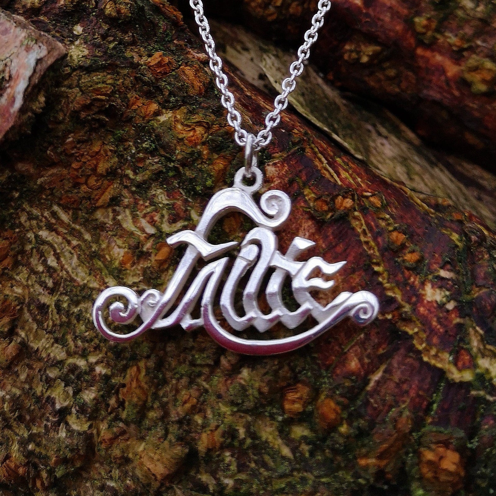 The sterling silver Gaelic Fáilte Pendant hand made by Irish Jewellery Designer Elena Brennan.