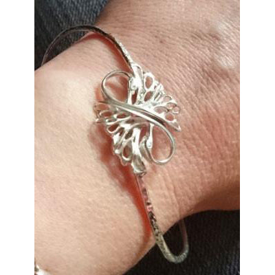 Children of Lir Forever Swan Bangle made of sterling silver.