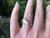 Hand showing off the sterling silver Horse Head Ring. This horse rings jewelry is handmade in Ireland.