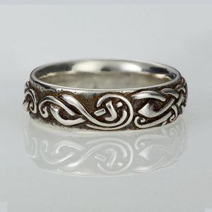 The Celtic Claddagh wedding band is an Irish wedding ring handmade by Irish Jewellery Designer Elena Brennan. This Irish wedding ring is made of sterling silver