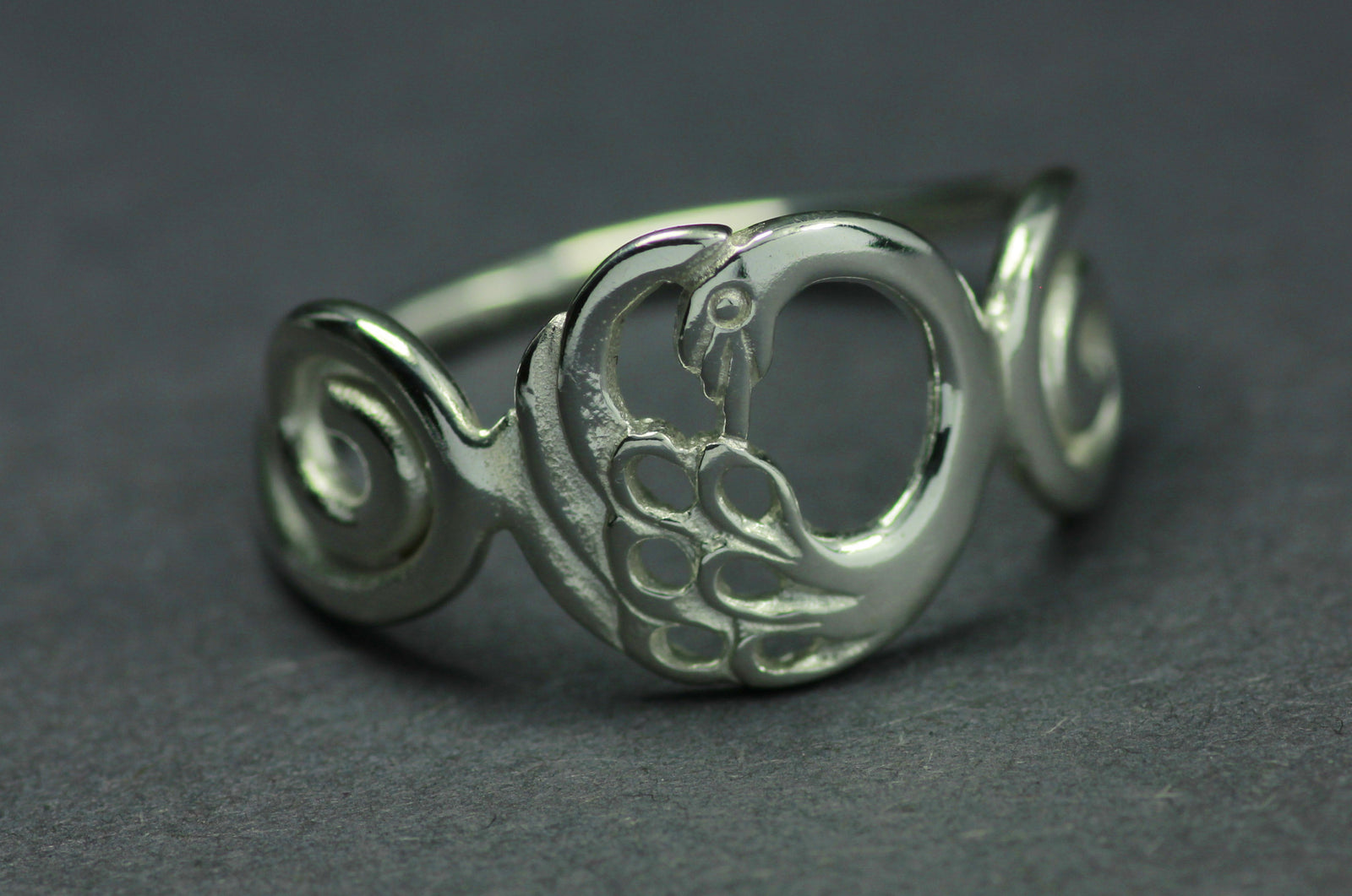 The Disc Swan Ring, from the Children of Lir Jewellery Collection.