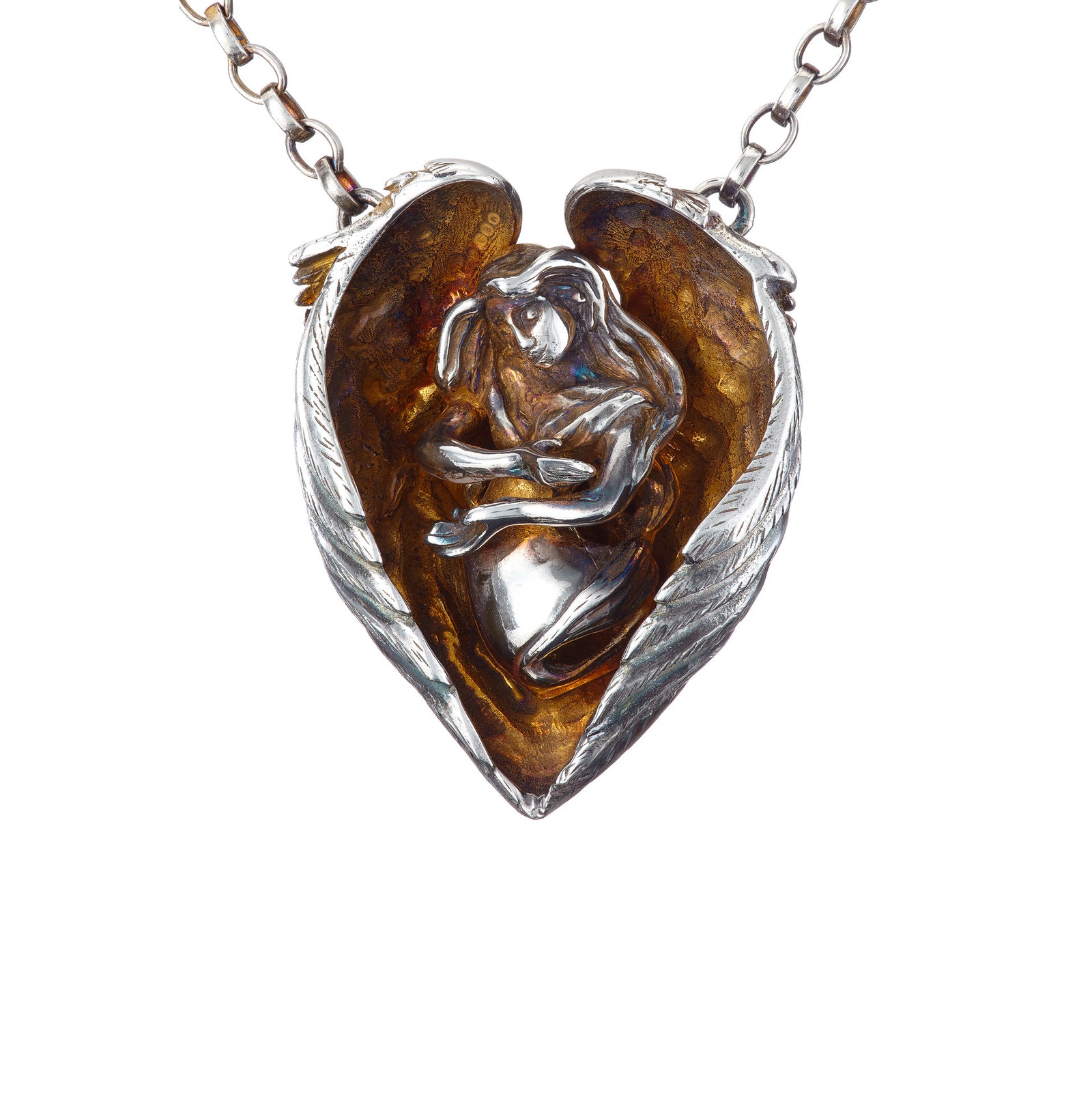 Sterling Silver Guardian Angel Pendant with heart shaped wings, so that the wearer is in the arms of the angel