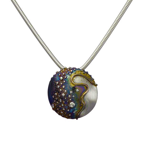Cúrsa an tSaoil medium domed pendant with a Patinated Silver finish, handmade in Ireland.