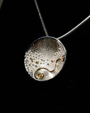 Detail of the silver Journey of Life pendant, handmade in Ireland.