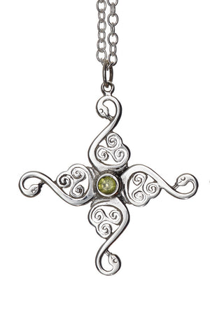Swan Cross Pendant. Sterling Silver with peridot gemstone detail. Inspired by the Irish legend, The Children of Lir.