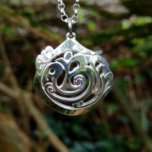 Close-up of the An Cabhán pendant made of sterling silver, inspired by the beautiful landscape of Co. Cavan.
