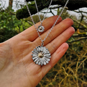 Sterling silver and gold daisy jewellery handmade in Ireland.