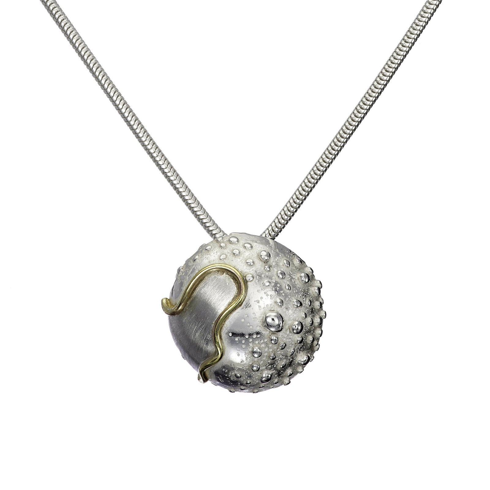 Small silver Irish Circles of Life pendant with gold decoration, handmade by Elena Brennan Jewellery