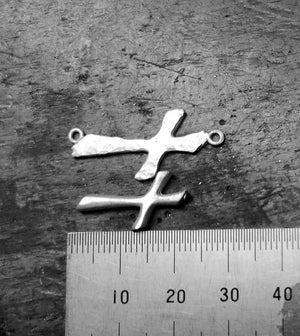 Measurement of small silver cross pendants, part of the My Angel jewellery collection.