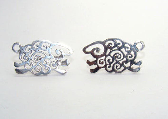 Spiral Sheep stud earrings made of sterling silver, handmade in Cavan, Ireland, by Elena Brennan Jewellery