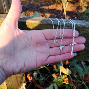 Small, medium and large St Bridget silver cross pendants.