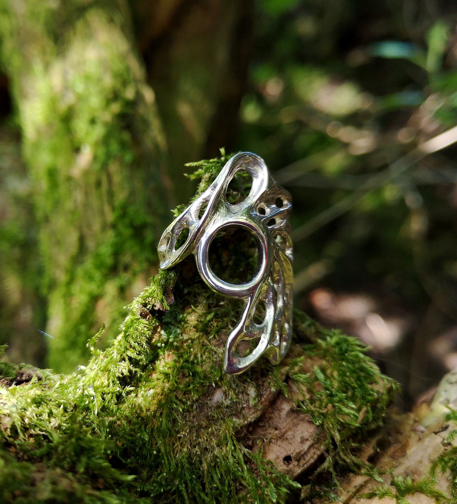 Twilight gossamer ring made of sterling silver with gossamer cobweb-like filigree detailing.