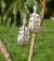 These Baby Angel Feather Drop Earrings are a reminder to a loved one of the angels presence always.