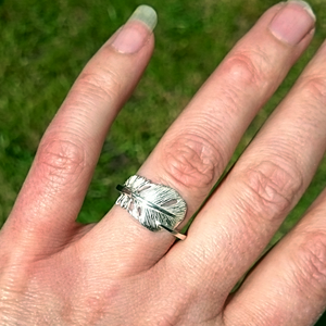"Cherish" is a sterling silver angel feather ring. This gift from the Angels will bring hope and joy to all. Irish handmade jewellery by Elena Brennan made in Cavan Ireland. 