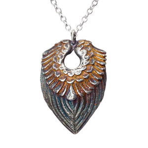 Sterling Silver oxidised Angel Wings Pendant with a gold heart on the inside, a special gift for a loved one! 