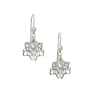 Lacy sterling silver earrings with a pearl nestled in it's centre, Elena Brennan Jewellery