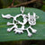 Daisy the Cow Pendant hanging on an 18 inch chain, handcrafted from sterling silver.