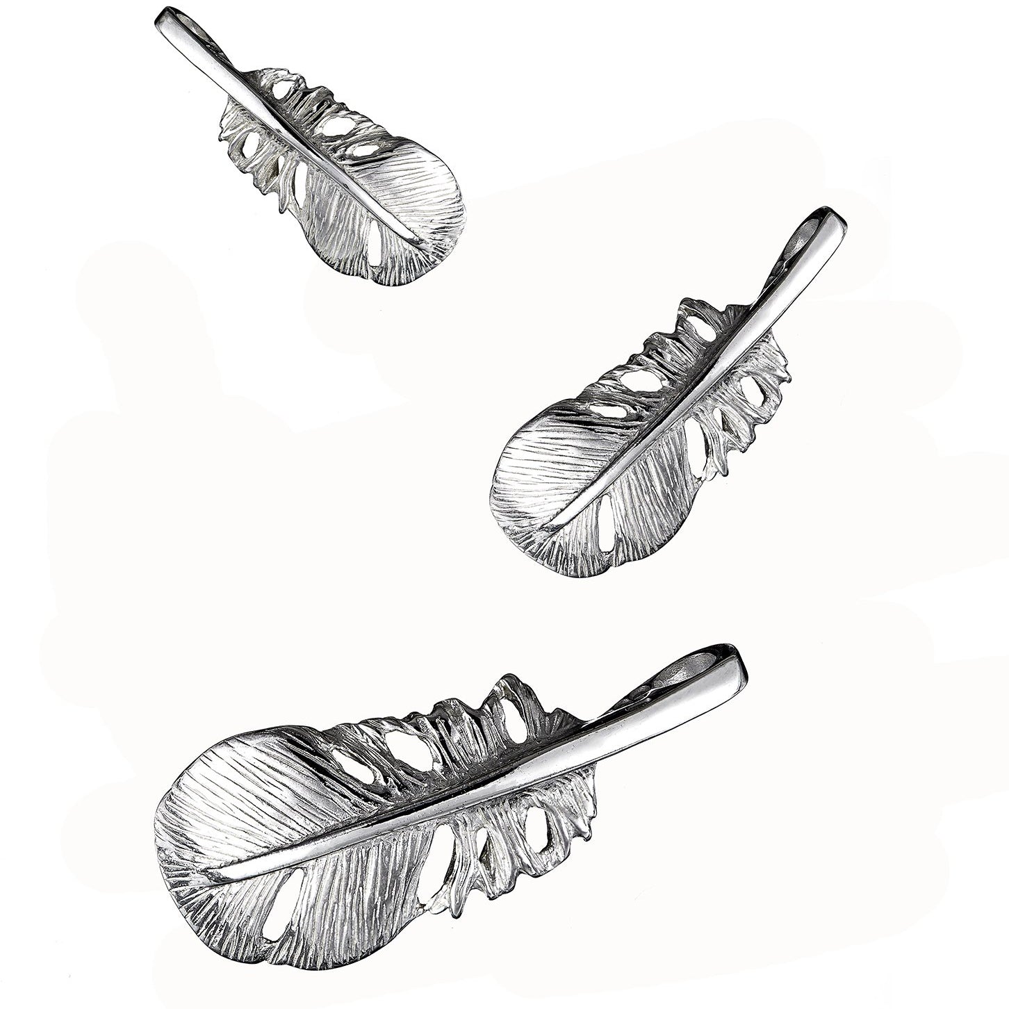 Baby Angel Feather Charm made from sterling silver, handmade by Irish jewellery designer Elena Brennan in Cavan, Ireland.