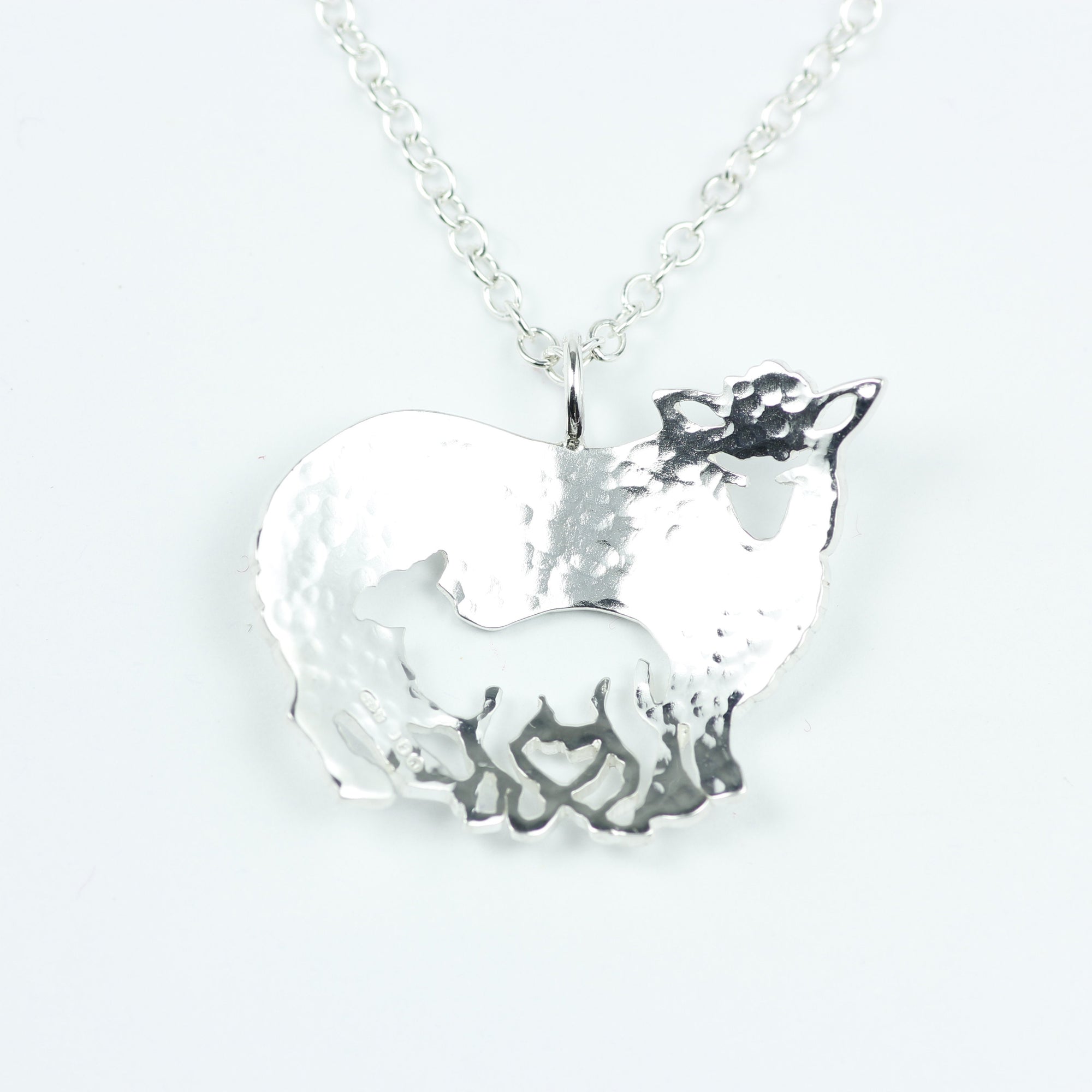 Mother and Lamb Pendant handcrafted from sterling silver with matching sheep brooch available.