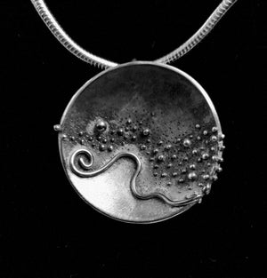 Cúrsa an tSaoil  large concave pendant handcrafted jewellery by Elena Brennan.